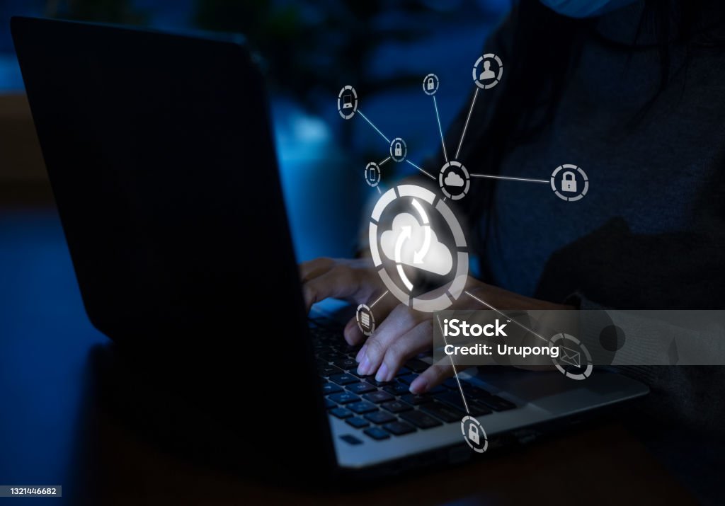 security, cyber, login, computer, digital, internet, password, privacy, solution, technology, attack, big data, cloud computing, Young businesswoman working on his laptop in the office, select the icon cloud on the virtual display.Concept digital technology and
cloud computing Software as a Service Stock Photo