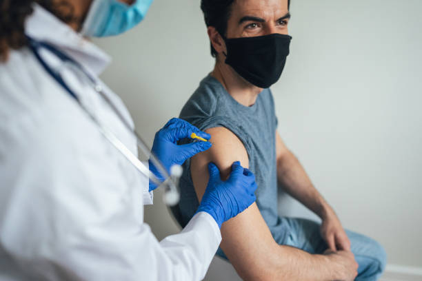 istock Doctor giving vaccine 1321448040