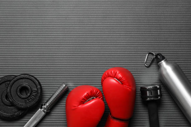 istock Flat lay composition with sports equipment on grey mat, space for text 1321452902