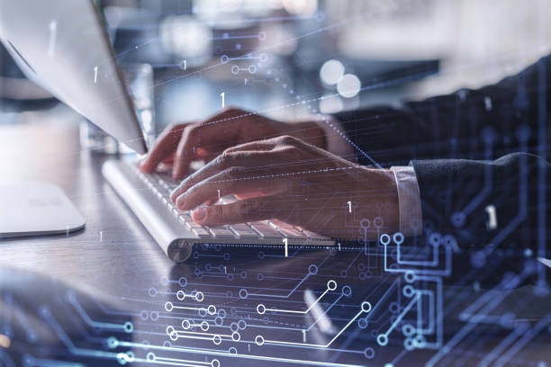 istock Hands typing the keyboard to create innovative software to change the world and provide a completely new service. Close up shot. Hologram tech graphs. Concept of Dev team. Formal wear. 1321454343