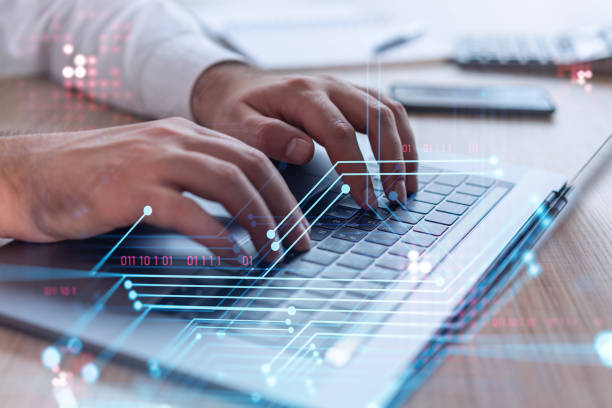 istock Hands typing the keyboard to create innovative software to change the world and provide a completely new service. Close up shot. Hologram tech graphs. Concept of Dev team. Formal wear. 1321454369