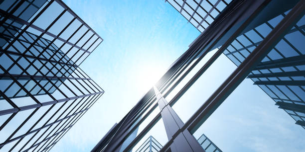 istock Low angle view of futuristic architecture, Skyscraper office building with cloud reflected on window, 3D rendering. 1321459269