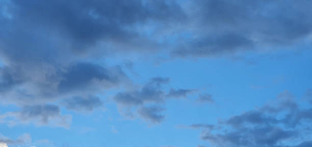 istock Cloudy dark color sky at sunset after summer rain. Space for text. 1321462217