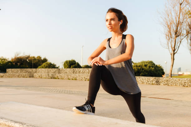 istock Sports woman make stretching exercises 1321463149