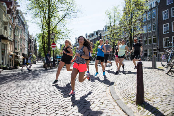 istock Group of runners training in the city streets 1321464453