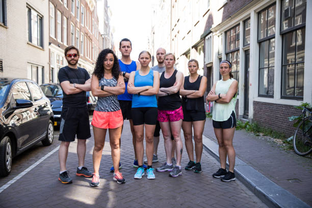 istock Group of runners training in the city streets 1321464731
