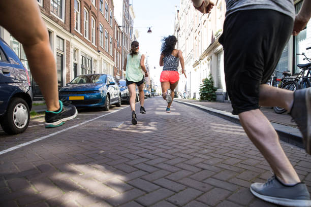 istock Group of runners training in the city streets 1321464849