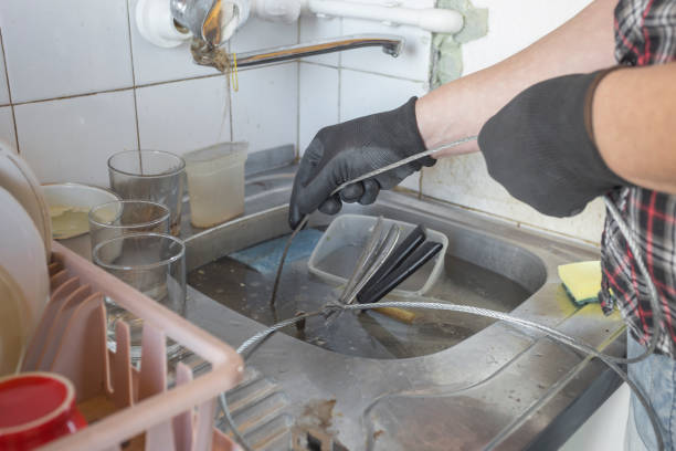 Unclog kitchen sink with metal cord