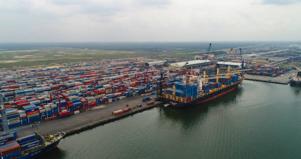 istock NIGERIA CUSTOM SERVICE ONNE NEW SEAPORT, STACK OF CONTAINERS 1321477973