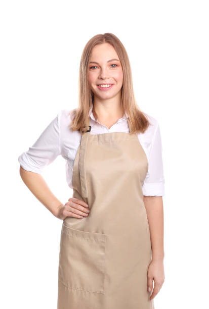 istock Beautiful woman in apron isolated on white background 1321478230