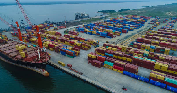 istock NIGERIA CUSTOM SERVICE ONNE NEW SEAPORT, STACK OF CONTAINERS 1321478830