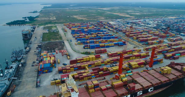 istock NIGERIA CUSTOM SERVICE ONNE NEW SEAPORT, STACK OF CONTAINERS 1321480741