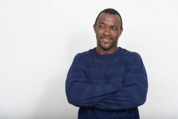istock Portrait Of Young Man Against White Background 1321481788