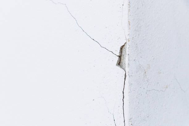 istock Crack at corner of white wall. 1321482121