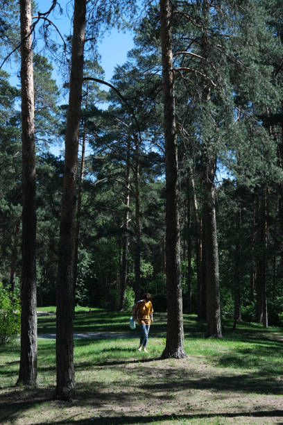 istock Mature woman is going to exercise in nature park 1321485071