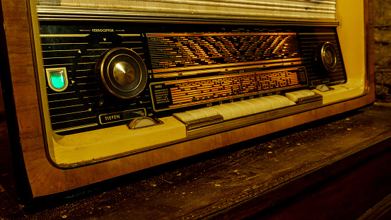 antique radio on wooden furniture