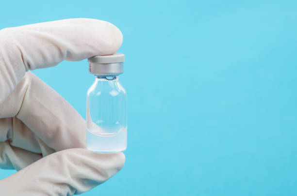 istock Close up injecting vaccination medicine on man doctor, 1321492523