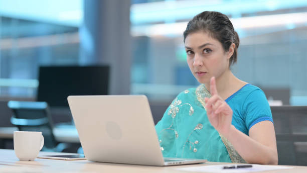 istock No Gesture by Young Indian Woman with Laptop 1321493880