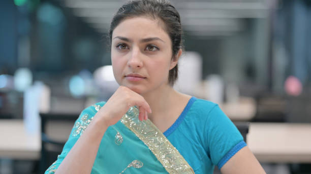 istock Pensive Indian Woman Thinking 1321494198