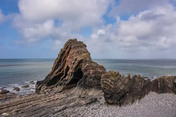 Stunning aerial drone flying landscape image of Blackchurch Rock on Devonian Geological formation in England