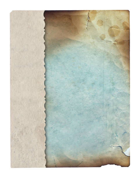 istock Old vintage texture retro paper with burned edges, stains and scratches background 1321494465
