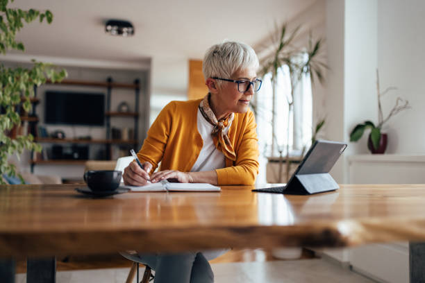 istock Senior businesswoman, working hard, from home office. 1321497119