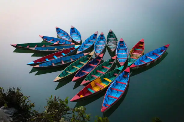 Colorful boats are seen at Phewa lake of Pokhara, one of the country's best tourist destinations, some 200km west of Kathmandu, capital of Nepal.