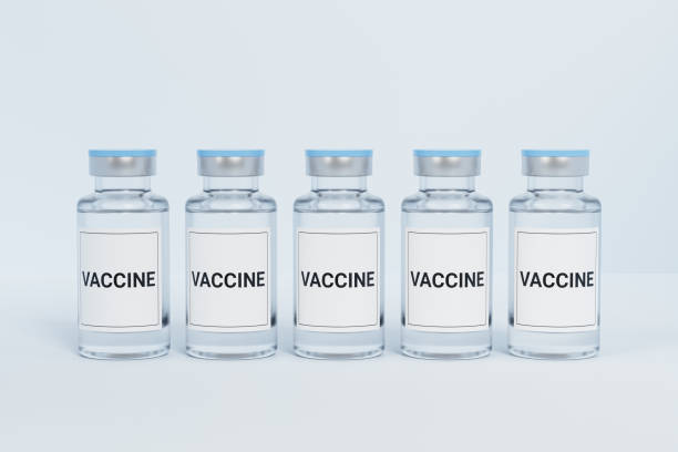 istock Vaccine ampoule glass bottles with label isolated on bright background, 3d rendering 1321498266