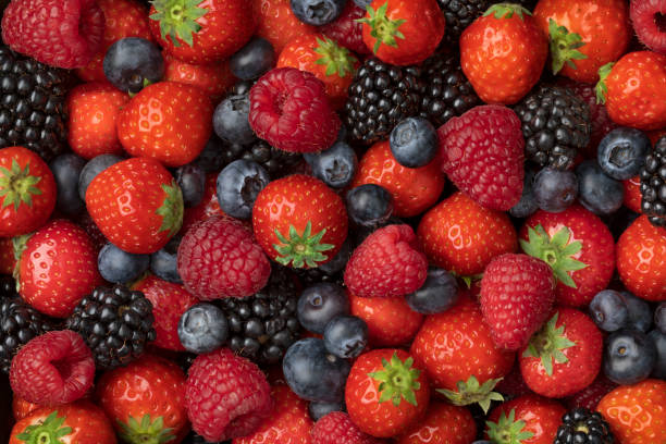 istock Variation of mixed summer fruit close up full frame 1321501179