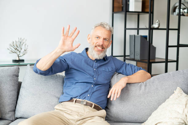 istock Video connect with modern mature grey-haired man 1321505357