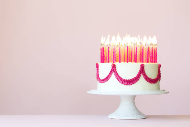 istock Birthday cake with lots of candles 1321505866