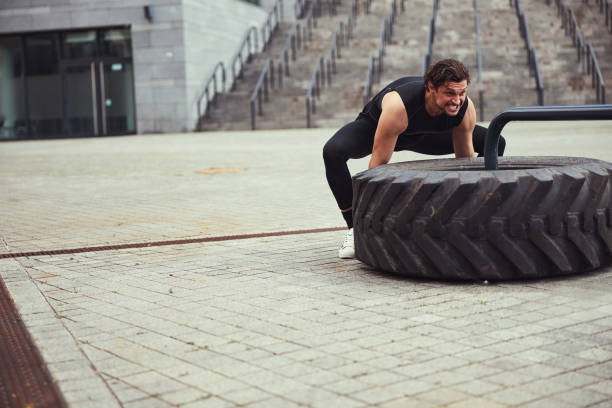 istock Focused photo on strong man doing gym 1321507196