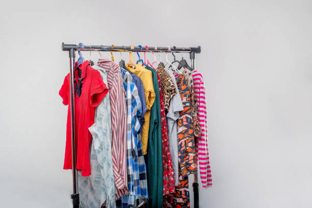 istock Various second-hand clothes from the wardrobe on the rack 1321510967