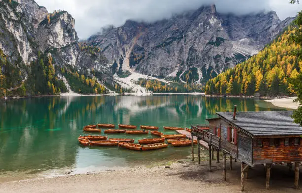 Photo of The beautiful Braies lake in late autumn, pearl of the Dolomite, UNESCO heritage