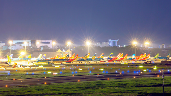 Due to the 4th wave of Covid-19 spread in Vietnam, all the local airlines including Vietnam Airlines, Vietjet Air, Pacific Airlines, Bamboo Airways, Vietravel Airlines and VASCO have cut off their flights from the beginning of May 2021.\n\nThis photo was taken the ramp at night time at Tan Son Nhat international Airport on 12th of May 2021.