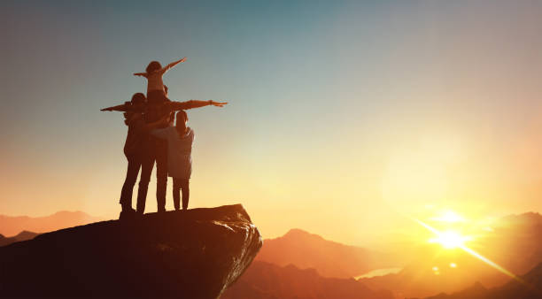 istock Happy family at sunset. 1321513431