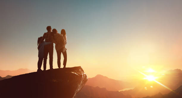 istock Happy family at sunset. 1321513440