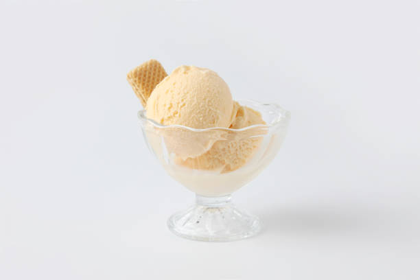 istock ice cream with wafer on dessert glass isolated on white background 1321513566