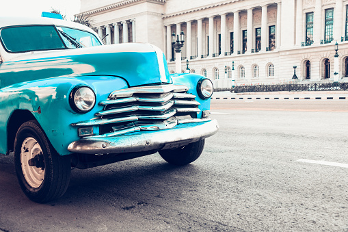 Old Blue Car Near El Capitolio Building In Havana, Cuba