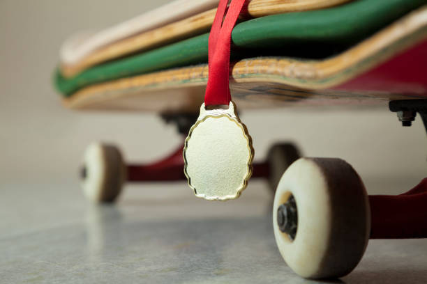 istock Skateboard with gold medal. 1321532058