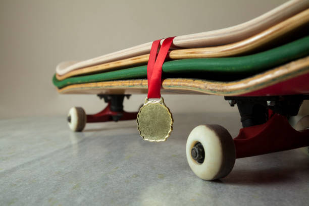 istock Skateboard with gold medal. 1321532310