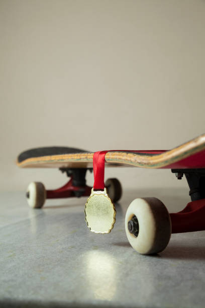 istock Skateboard with gold medal. 1321532582