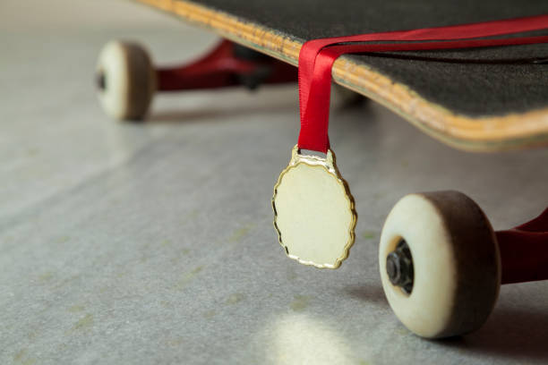 Skateboard with gold medal.