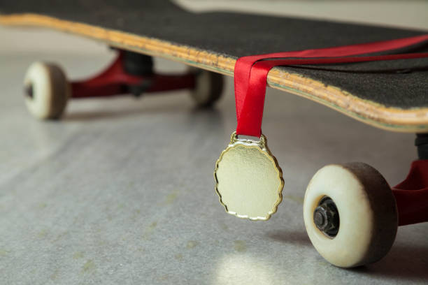 istock Skateboard with gold medal. 1321532690
