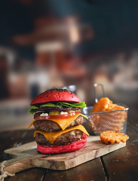 Red Bun Double Beef Burger with Tomato, Cheese, Avocado, Pickles Served with Chip Fries