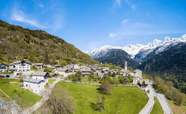 panorama aerial image of the swiss mountain village soglio - engadine switzerland village church imagens e fotografias de stock