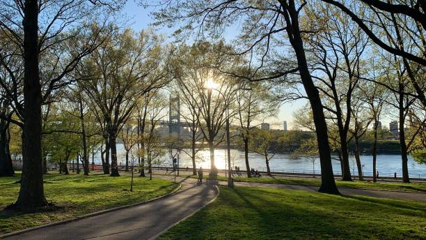 Astoria Park East River Hell Gate Bridge, East River, RFK Bridge, park harlem park stock pictures, royalty-free photos & images