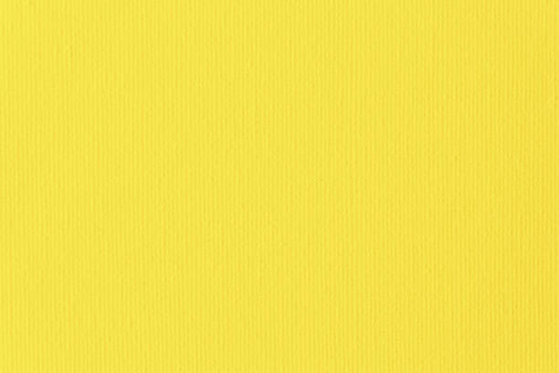 motivo in tela gialla arte illuminante sfondo estivo giallo totale lino cotone bianco brillante texture soleggiata primo piano colore alla moda 2021 macro fotografia - pantone 2021 foto e immagini stock