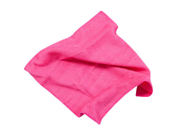 istock Pink folded napkin top view isolated on white background 1321550230