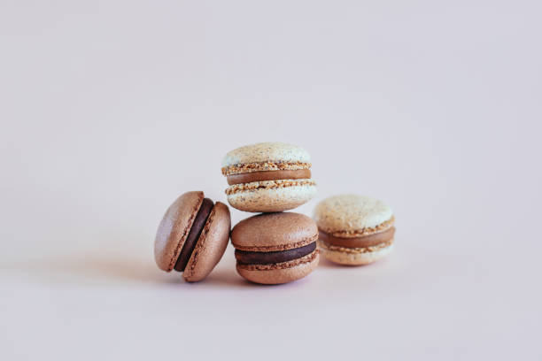 istock Tasty French macarons on a pastel background. 1321550264